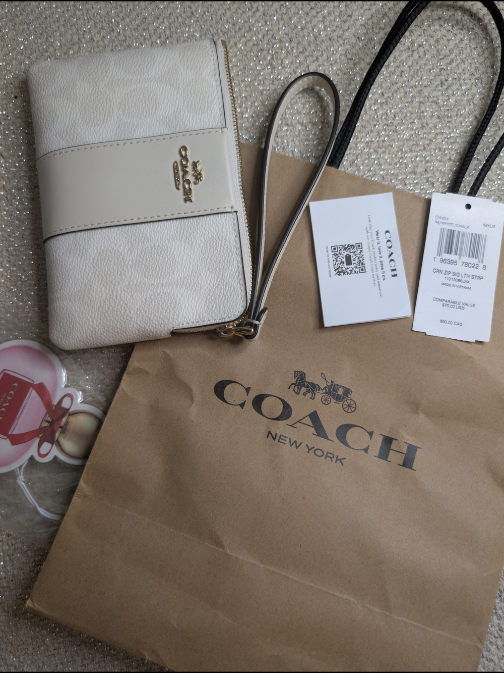 Coach Cream White Pebbled Leather Wristlet with Gold Logo